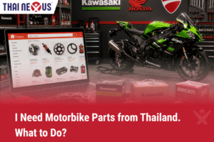 A high-quality image set in a professional motorcycle garage featuring a lime green Kawasaki Ninja sportbike and boxes of genuine parts for Kawasaki and Ducati. On the left, a laptop displays the Shopee Thailand marketplace, showcasing various motorbike components like sprockets and shock absorbers. The bottom of the image features a bold red banner with the white text "I Need Motorbike Parts from Thailand. What to Do?", while the Thai Nexus name and logo appear in the top left corner, positioning Thai Nexus as the solution for sourcing and shipping these parts internationally.